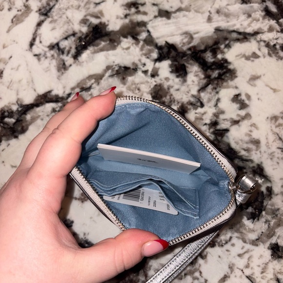 NWT Coach Corner Zip Leather Wristlet Perforated Flower In Metallic Silver - Picture 4 of 7